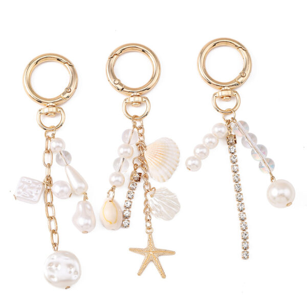 Wholesale Trendy Pearl Rhinestone Keychain Zinc Alloy Fashion Accessory for Bag or Car Key