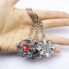 oly-dbfa1ccfb46e781c2699d5fb7ca231f8 Wholesale Retro Red Gemstone Skull Alloy Keychain Pendant Boutique Resale Keychain Accessory