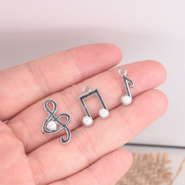 oly-dc00e3d3c3e039334aef815e1443d1c5 Wholesale Zinc Alloy Electroplated White Music Note Pendant DIY Keychain Accessory Fashion Craft Supply