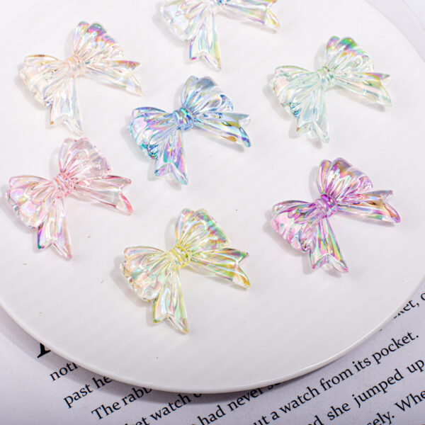 oly-dc00f9baadc7aaf70127e9988b3584cf Wholesale Bow Tie Butterfly Knot Acrylic Loose Beads Transparent UV Plated for DIY Phone Chain Making