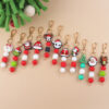 oly-dd13e319ec32a594e582aca313cd5260 Wholesale Silicone Santa Claus Keychain Chic Holiday Gift Bag Charm Car Accessory