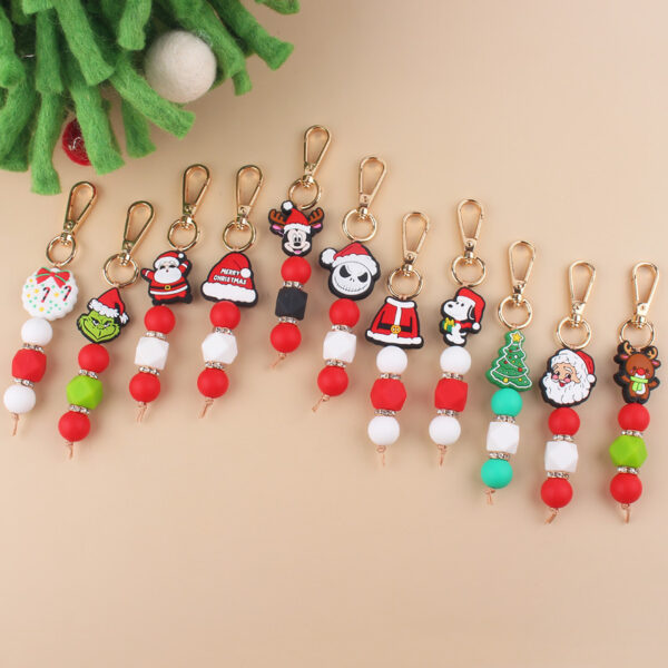 oly-dd13e319ec32a594e582aca313cd5260 Wholesale Silicone Santa Claus Keychain Chic Holiday Gift Bag Charm Car Accessory