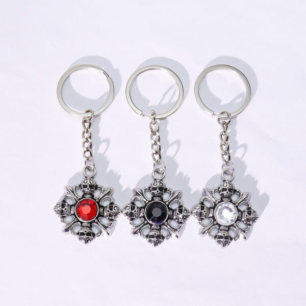 oly-dd5aae3febd6add14e080d5055ef4b9f Wholesale Retro Red Gemstone Skull Alloy Keychain Pendant Boutique Resale Keychain Accessory