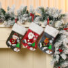 oly-ddf3d0d4ac942413c05c94496fb7c34f Wholesale Polyester Plush Christmas Stocking Cartoon Santa Design Decorative Accessory for Holiday