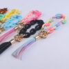 oly-de1cbcd20b2bdf23f044bcd3949b234b Wholesale American Style Leather Tassel Keychain for Women Pink Trendy Car Key Accessory