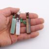 oly-dec4e7ed14b80d70305b5ee46dda386f Wholesale Cylindrical Woven Crystal Keychain Pendant Stylish Geometric Gemstone Jewelry Accessory for Bag Charm Gift