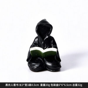 Dy2265b black man reading book halloween ornament