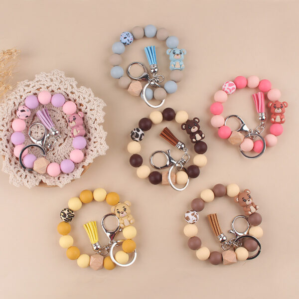 oly-dece36cad146a9a0ef0a851d39b765ee Wholesale Silicone Cartoon Bear Keychain Accessory Korean Style Gray Blue Cute DIY Bead Bracelet Gift