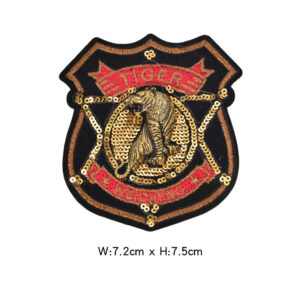 Shield-shaped tiger badge