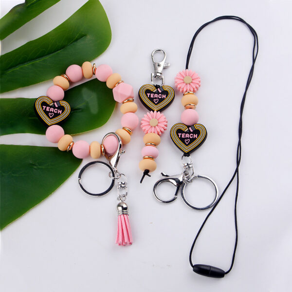 oly-e1aabab4b31c58870d237ed8cfad496a Wholesale Cartoon Silicone Bead DIY Bracelet and Keychain Trendy Fashion Accessory for Women