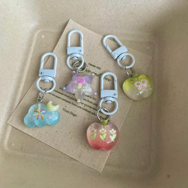 oly-e1fa2ff10156077b5615e6dd8f9d85c6 Wholesale Resin Star Cloud Bag Charm Cute Keychain for Girls Trendy School Backpack Accessory