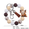 oly-e201683637364f6f5681f06285db8ef2 Wholesale Silicone Cartoon Cow Keychain with PU Leather Tassel Fashion Accessory Bag Charm for Gift Boutique Resale