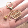 oly-e2365374e9628768f385110793d514f8 Wholesale Trendy Miniature Bread Plate Pendant Alloy Baking Paint Bag Charm DIY Keychain Accessory