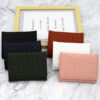 oly-e2470e41e849d2266750771c562bb236 Wholesale Modern PU Leather Tri Fold Wallet with Braided Pattern White Boutique Resale