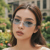 Wholesale Frameless Oval Sunglasses with Ring Detail for Travel Fashion Accessory