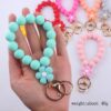 oly-e411589af158a1b65c4965b1f671c3b1 Wholesale Pink Silicone Cartoon Flower Beaded Wristband Keychain Boutique Jewelry Accessory