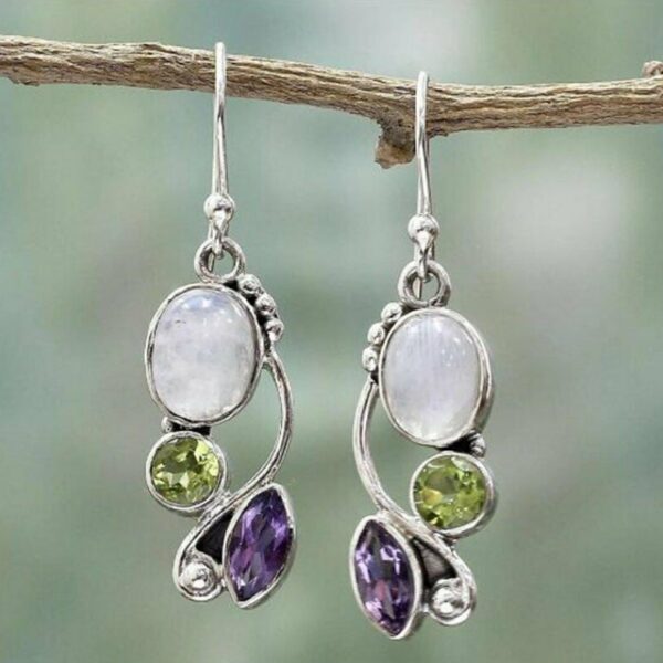 oly-e4fbadb15301ab42e90174db62690030 Wholesale Alloy Blue Topaz Drop Earrings Creative Rotating Geometric Trendy for Women