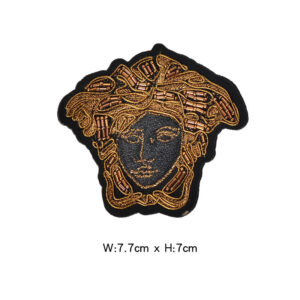 Brown character badge