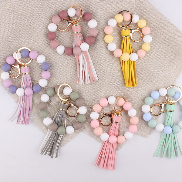 oly-e56407c3cb7ea9641bd43883ef2f9a07 Wholesale Silicone and Wood Wrist Keychain Pendant European Style Green Key Ring Fashion Accessory for Birthday Gifts