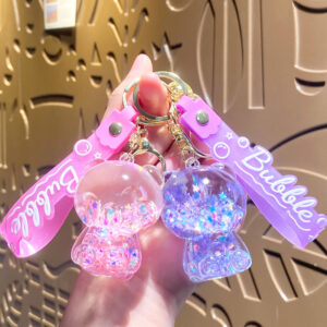 oly-e5c48301db2bf67b540281f0505df60d Wholesale Glow in the Dark Oil Filled Acrylic Bear Bag Charm Keychain Fashion Accessory Boutique Resale