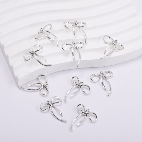 Wholesale Chic Bow Pendant Alloy Baking Paint DIY Jewelry Accessory for Necklace Keychain Craft