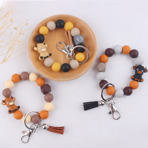 oly-e62d32f4a0373a1dcd62e5bdea706d46 Wholesale Silicone Cartoon Cow 3D Keychain Khaki Festival Gift Fashion Accessory