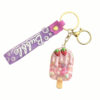 oly-ea33df28f22fe2d69ac90606cbba4d71 Wholesale Acrylic Liquid Sand Ice Cream Jelly Bean Keychain Trendy Bag Charm Birthday Gift