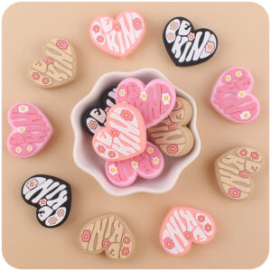 oly-ea7e57eb2ea4f627b0aab7684cd5371e Wholesale Boutique Cartoon Love Heart Silicone Baby Teether Teething Accessory