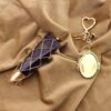 oly-eaf990ab571af558eb24b847602e9e44 Wholesale Metal Mesh Pouch Bag Charm Keychain Trendy Personalized Design for Everyday Use
