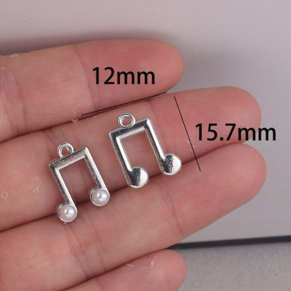 oly-ed9567cf524aecd8f4acfc016f56e1ab Wholesale Zinc Alloy Electroplated White Music Note Pendant DIY Keychain Accessory Fashion Craft Supply