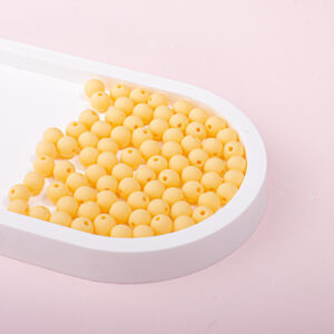 Y085 tooth color / 6mm, aperture is about 1mm (about 165 pieces in a pack of 20g)