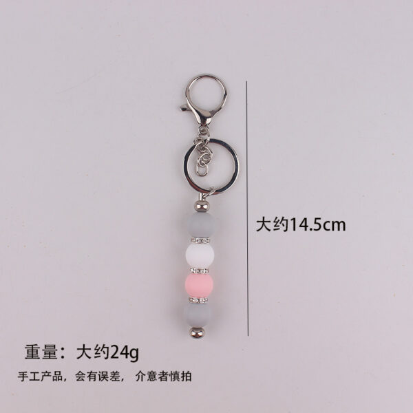 oly-eeaeac9c9a9d6aa2f3eef358cf84023e Wholesale DIY Silicone Bead Keychain Maple Leaf Red Bag Charm Gift