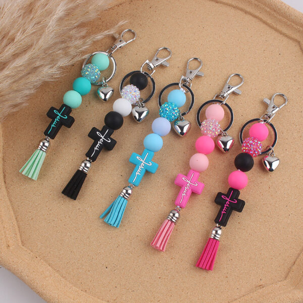 oly-eef9f7c8d1cf071a66dd387cdf784749 Wholesale Silicone Cross Tassel Beaded Keychain Black White Car Key Accessory Boutique Resale