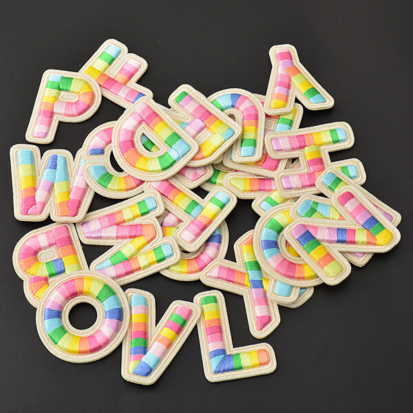 oly-eefbb1f8eb644a601f4d7cb8fdc700fc Wholesale Colorful Embroidered Letters Polyester Self-Adhesive Patches DIY Accessory for Clothes Bags Phones
