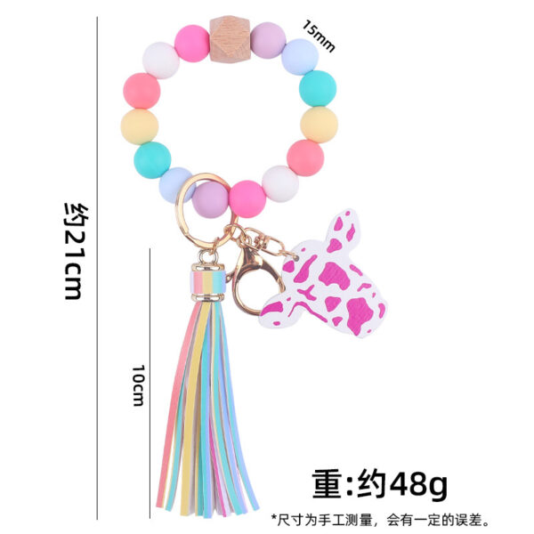 oly-ef2328120a4eaa343d02a0f98d97bc43 Wholesale Western Style Bull Head Keychain Bracelet Silicone Bead with Tassel Fashion Accessory