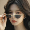 Wholesale Oval Rhinestone Metal Folding Sunglasses Gold Frame for Everyday Outdoor Use