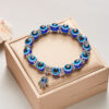 oly-f3cdaa4cbc02cb70bbbc80974f21bd13 Wholesale Handmade Resin Evil Eye Hand of Fatima Bracelet Tourist Souvenir Jewelry Accessory