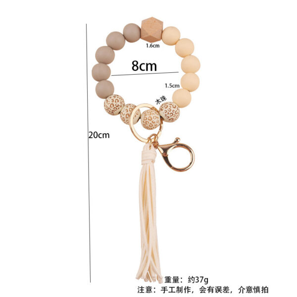 oly-f3e1bf2bfb15904b789551d632384c39 Wholesale European Style Silicone Bead DIY Bracelet Keychain with Leather Tassel Fashion Jewelry Accessory Gift
