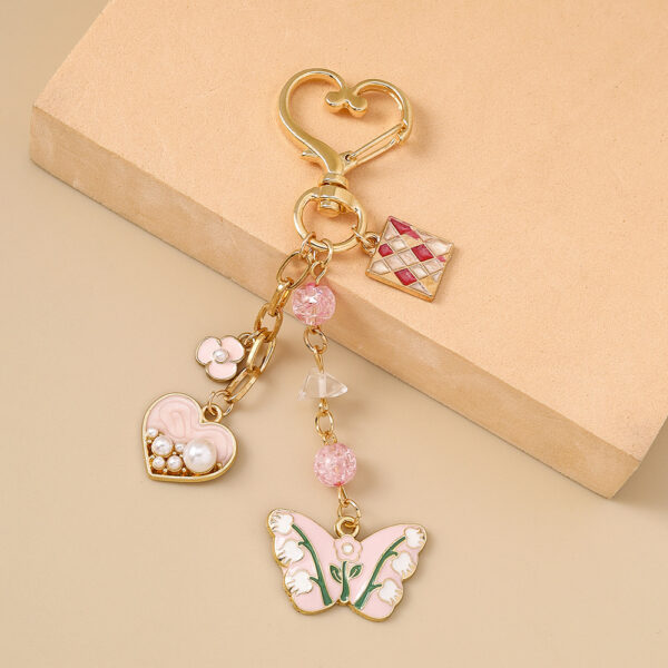Wholesale Blue Zinc Alloy Heart Butterfly Keychain Trendy Bag Charm for Backpacks Bags