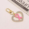 oly-f53bf51b92d9383764507f76166080bb Wholesale Modern Rhinestone Heart Keychain Alloy Pink Ribbon Car Key Accessory Gift