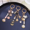Wholesale Cute Shell Starfish Pearl Beaded Keychain Zinc Alloy Decorative Accessory for Bag Charm or Gift