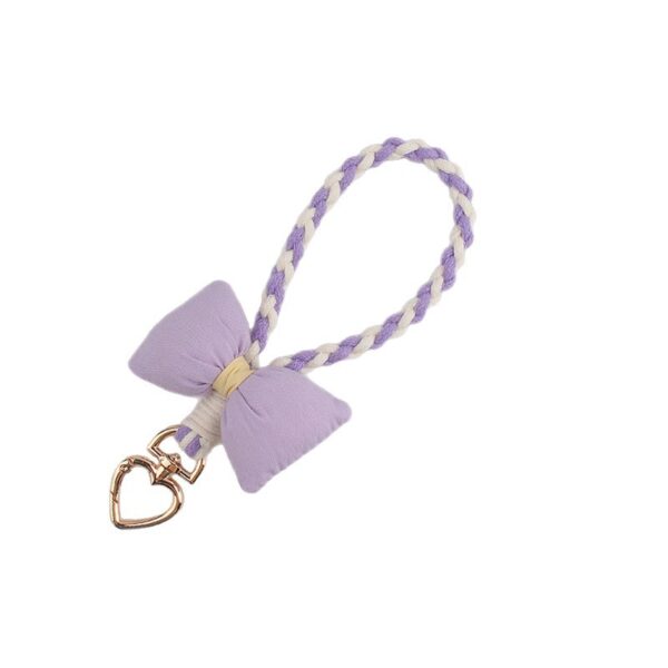 oly-f74b3145e0ee00b7baff5e0b7230a23f Wholesale Silicone Dopamine Bow Phone Strap Heart Keychain Fashion Accessory Yellow