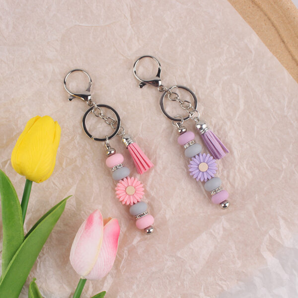 oly-f76046f6fd545d25ed6e538e2634919f Wholesale Silicone Keychain - Stylish Bag Charm with Tassel, Pink, Party Favor Gift