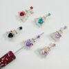 oly-f8336918ac743bbbefe44f25aac452cb Wholesale Eiffel Tower Double Sided Alloy Pendant Charm Purple DIY Phone Keychain Accessory