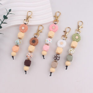 oly-f84a4a382b35b14b7f257dd0754b25ae Wholesale DIY Silicone Bead Keychain Bag Charm Decorative Accessory for Everyday Use