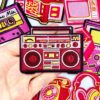 oly-f8a44e5b3fc6a374f9375a38e4a59e5c Wholesale Trendy Pink Retro Record Player Game Console Embroidered Patch for Shoes Hats Boutique Gift