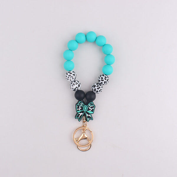 oly-f8b47de98544441028f5130bb3f69fe3 Wholesale Korean Style Silicone Cow Bow Keychain Charm Trendy Bag Car Key Accessory Gift