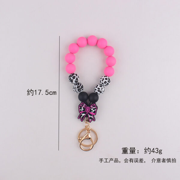 oly-fa96283391eeb568720d762f5c760939 Wholesale Korean Style Silicone Cow Bow Keychain Charm Trendy Bag Car Key Accessory Gift