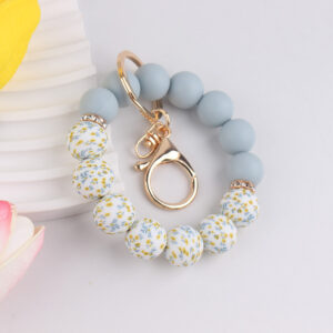 oly-faf75efca741f39250bf7cb890d5ac57 Wholesale Water Transfer Silicone Bead Keychain Fashion Accessory Gift for Party
