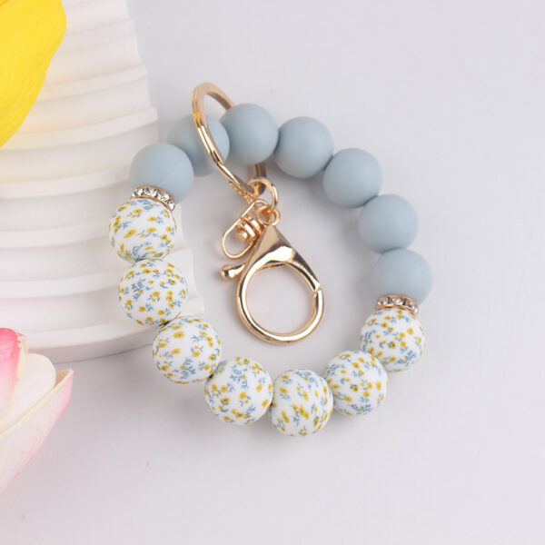 oly-faf75efca741f39250bf7cb890d5ac57 Wholesale Water Transfer Silicone Bead Keychain Fashion Accessory Gift for Party